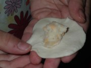 Don't over fill. If filing gets in the area to be sealed, the perogie will break apart in the water and give you perogie soup.